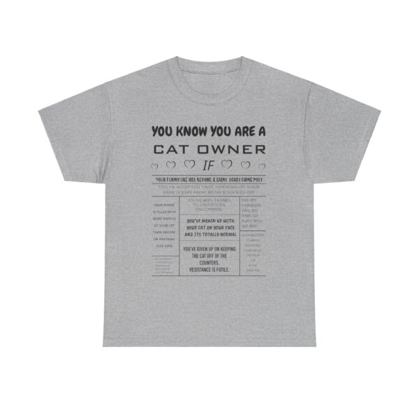 Funny cat owner T-shirt with humorous sayings about life with cats, featuring phrases like “Your furniture has become a giant scratching post” and “You’ve woken up with your cat on your face and it’s totally normal.